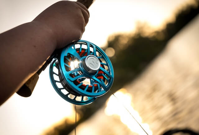 Flyfishing Reel catching fish